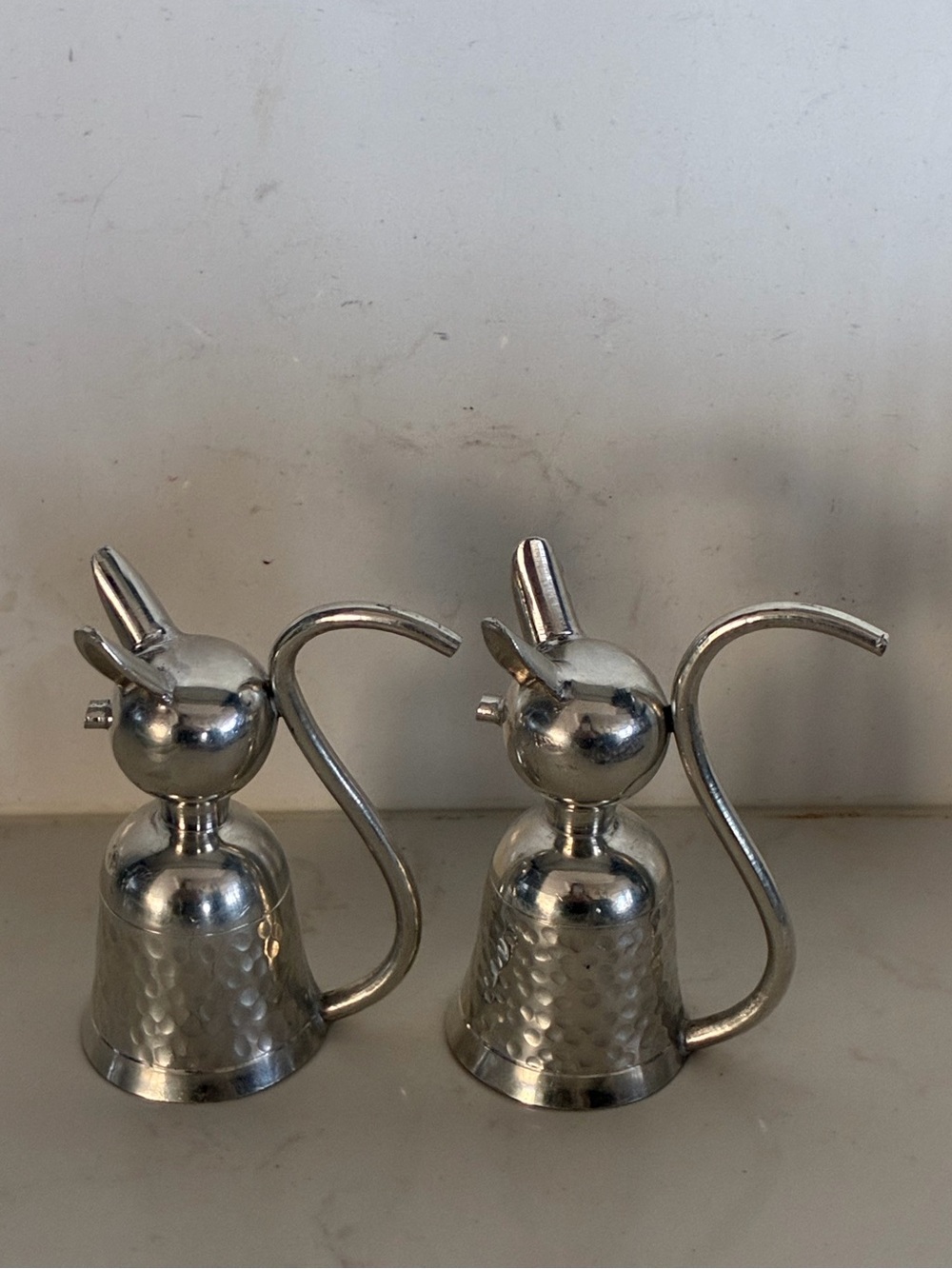 Set of Mid century modern (1960s) pewter minimalist cat and upside-down cups